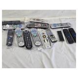 Lot of Remote Controls including Spectrum, DirecTV, Panasonic, and Xfinity