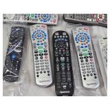Lot of Remote Controls including Spectrum, DirecTV, Panasonic, and Xfinity