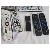 Lot of Remote Controls including Spectrum, DirecTV, Panasonic, and Xfinity