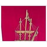 Wooden Ship Sculpture in Frame on Red Velvet Background  23.5x38.5