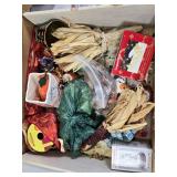Box of Holiday Decorations with Crystal Party Plate, Corn Decorations, and Santa Figurine