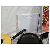 Vintage Kitchen Items including Wilton Performance Pans, Yellow Pot, and Assorted Cookware