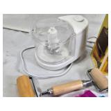 Various Kitchen Tools and Small Appliances including Zyliss Blitzhacker Food Chopper, Cuisinart Microwave Popcorn Maker, and Other Accessories