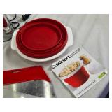 Various Kitchen Tools and Small Appliances including Zyliss Blitzhacker Food Chopper, Cuisinart Microwave Popcorn Maker, and Other Accessories
