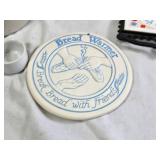 Stoneware Jug, Crock, and Bread Warmer Set with Decorative Trivet