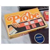Pictionary First Edition, Scrabble, Probe, and Dragon Dominoes Board Games Set - Uncounted