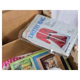 Box of Craft Supplies Including Cross Stitch Fabric, Dress Bag, and Polyester Fiberfill