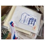 Box of Craft Supplies Including Cross Stitch Fabric, Dress Bag, and Polyester Fiberfill