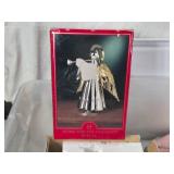 Christmas Decorations and Fabrics Lot including Angel Figure, Santa and Snowman Figurines, and Various Fabrics