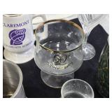 Assorted Drinkware Collection including Claremont Graduate School Mug, Geigy Agricultural Chemicals Stein, and 50th Anniversary Glass