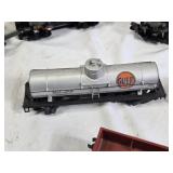 American Flyer Model Train Set including Engine, Tank Car, Boxcar, and Caboose