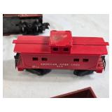 American Flyer Model Train Set including Engine, Tank Car, Boxcar, and Caboose