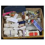 Box of Sewing Supplies including Threads, Bobbins, and Needles, Elastic Bands, and Lace Trim