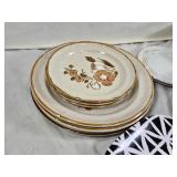 Vintage Dinnerware and Bowls with Floral Designs and Geometric Patterns