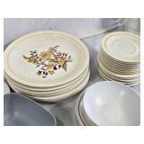 Vintage Dinnerware and Bowls with Floral Designs and Geometric Patterns