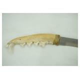 Vintage custom fixed blade knife. 6.5" overall length. hand crafted from an animal jawbone. 3" blade
