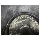 1959-D Brilliant Uncirculated Silver Franklin Half Dollar