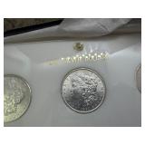 Six Beautiful Uncirculated New Orleans Mint Silver Morgan Dollars in a Capital Case- 1898-O, 1899-O, 1900-O, 1901-O, 1902-O, and 1904-O