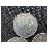 Three Silver Morgan Dollars: 1921 P-D-S