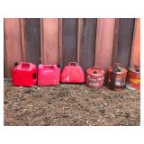 Lot of 6 Gas Cans - 4 Metal and 2 Plastic and the 2 of the tanks have fuel in them