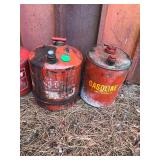 Lot of 6 Gas Cans - 4 Metal and 2 Plastic and the 2 of the tanks have fuel in them