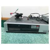 Quasar VHS Recorder and Player / JVC VHS Player / Magnavox DVD player