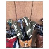 4 - Golf Bags with Club and all Kinds of Surprises in The Pockets