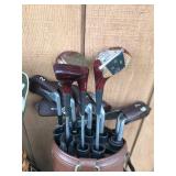 4 - Golf Bags with Club and all Kinds of Surprises in The Pockets