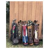 4 - Golf Bags with Club and all Kinds of Surprises in The Pockets
