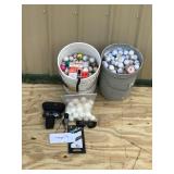 2 - 5 Gallon Pails of Golf Balls - Pair of Golf Gloves - 2 Pair of Sunglasses - Pat Golfer Wrist Counter, Range Finder and bag of whiffle balls