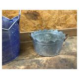 2 - Metal Baskets / One has roses on the side and the other has snow flakes