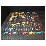 box of toy Indians, cowboys, horses, fence and animals