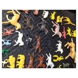 box of toy Indians, cowboys, horses, fence and animals