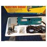 New electric shears for smooth cutting thru 18 gauge sheet metal, aluminum, and PVC