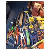 Tote of new and used tools