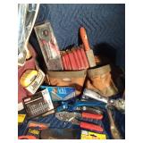 Tote of new and used tools