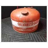 2) 2 1/2 gal gas cans and 5 gal. OMC gas can, boat gas tank