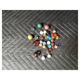 Marbles - some glow green under black light