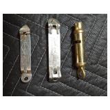 Vintage bottle openers, whistle, keys and a pipe