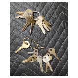 Vintage bottle openers, whistle, keys and a pipe