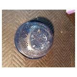 Lot of cookbooks, power control center, and enamelware colander,