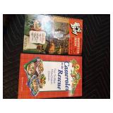 Lot of cookbooks, power control center, and enamelware colander,