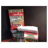 3 boxes of Christmas light bulbs, lights, garland and more