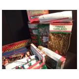 3 boxes of Christmas light bulbs, lights, garland and more