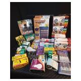 Light bulbs, rug clippers, Battery organizer, large box, chandelier bases and night lights