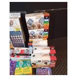 Light bulbs, rug clippers, Battery organizer, large box, chandelier bases and night lights