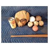 Vintage catchers mitt, baseball bat, baseballs and can of plastic badminton shuttlecocks and more