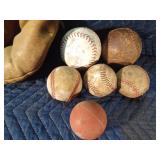 Vintage catchers mitt, baseball bat, baseballs and can of plastic badminton shuttlecocks and more