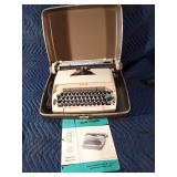 Vintage Sears electric typewriter in case with manual - works