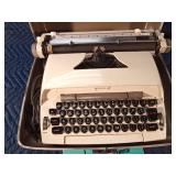 Vintage Sears electric typewriter in case with manual - works